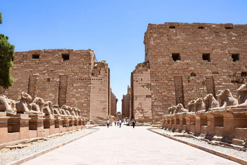 Avenue of ram-headed sphinxes leading to the first pylon of Karnak