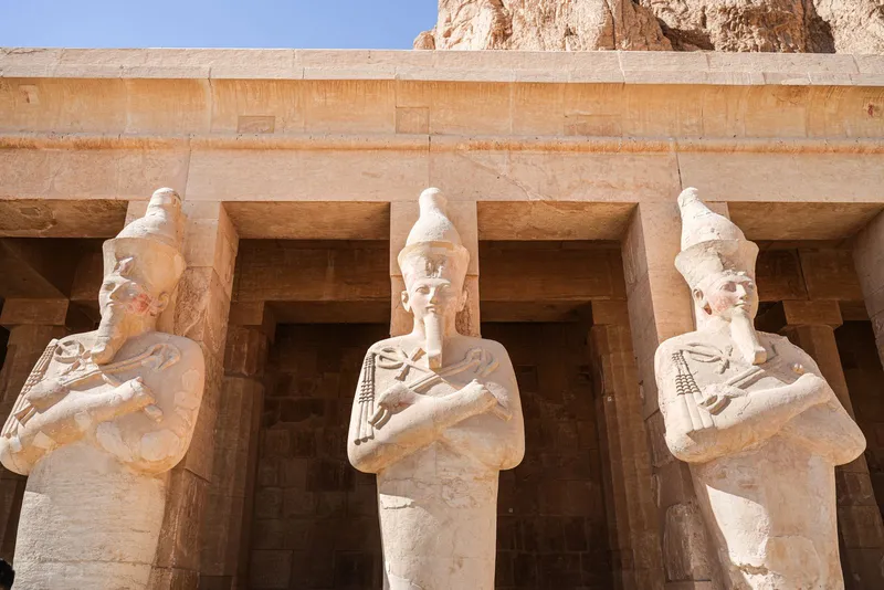 Three Osiride statues on the colonnade of the Temple of Hatshepsut