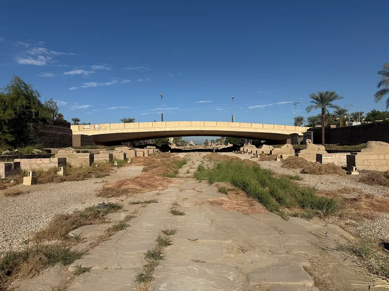 Road bridge crossing the Avenue of Sphinxes, with rows of sphinxes on either side