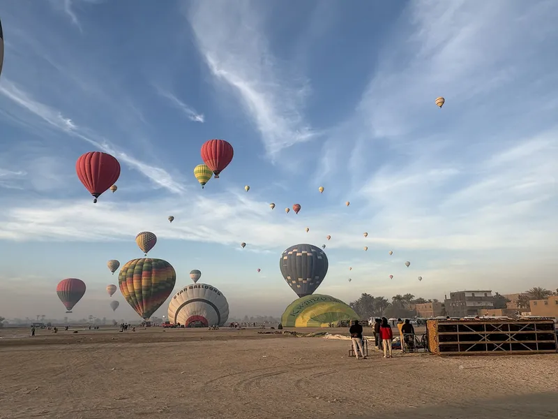 Sky full of hot air balloons over the launch field