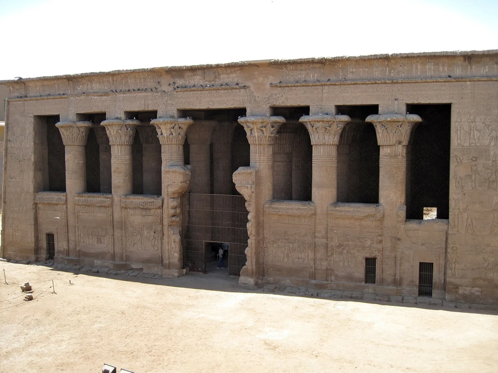 The full columned front of Esna temple seen from above the excavation pit