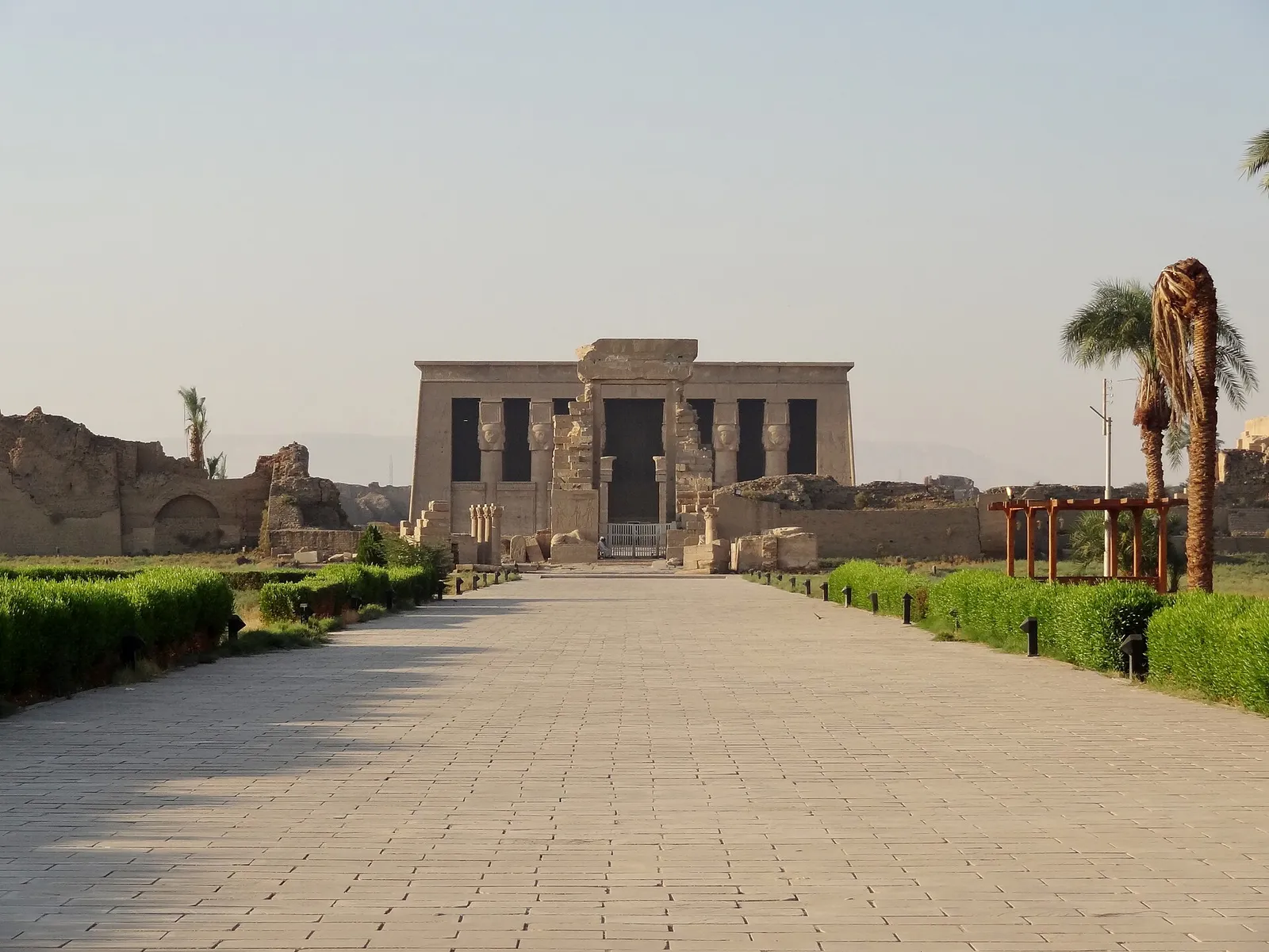 Paved approach to the Dendera temple, its columned facade straight ahead